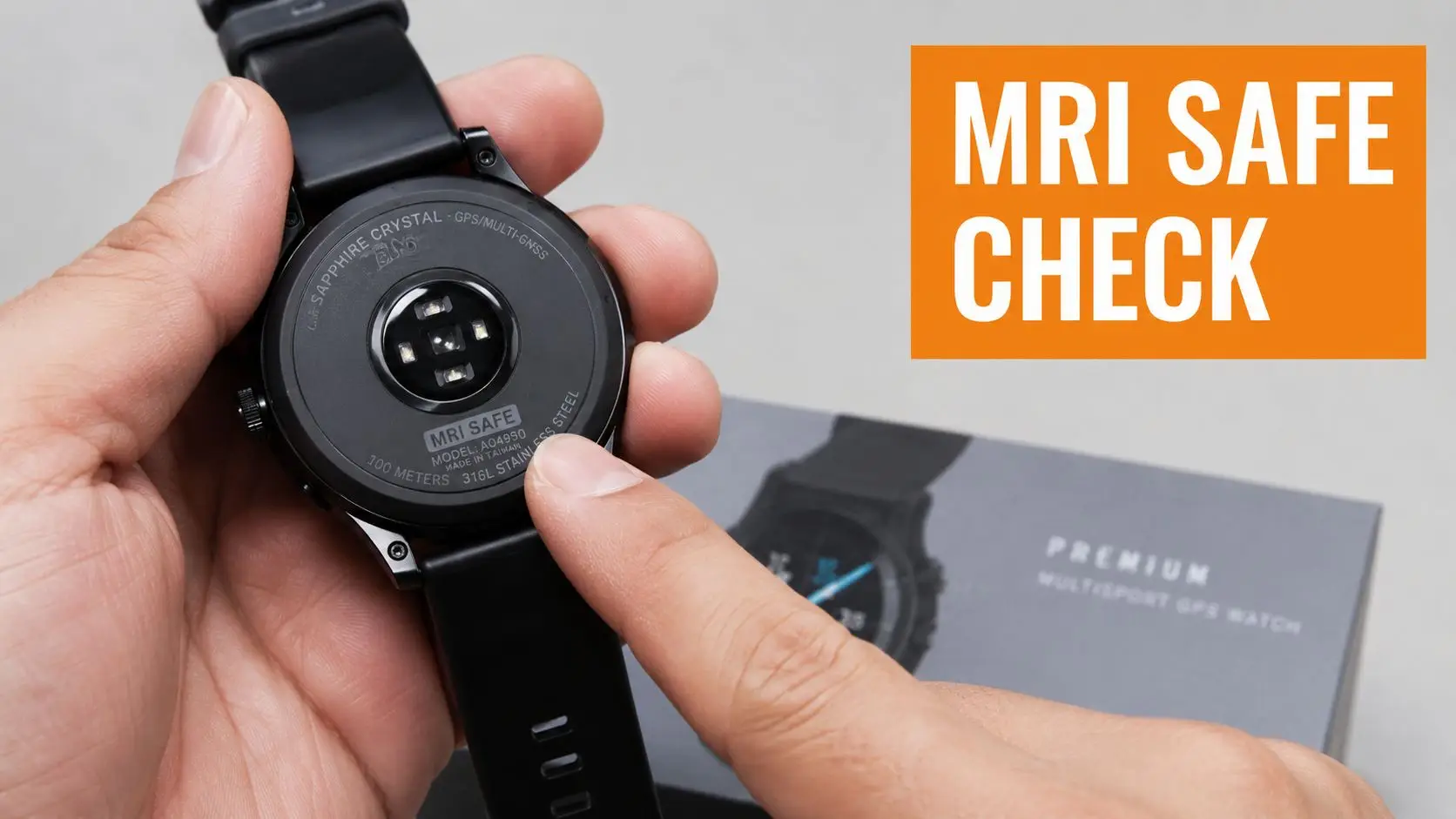 A hand points to the MRI SAFE label on the back of a premium multisport GPS watch.